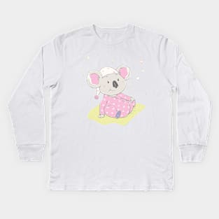 Lovely cute koala is sitting on the grass Kids Long Sleeve T-Shirt